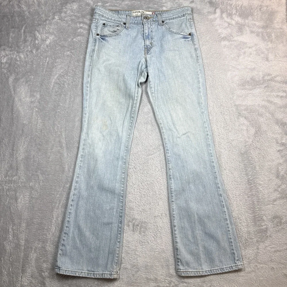 Vintage Levi's 518 Superlow Bootcut Jeans 31x31 Blue Light Wash Low Rise Stained